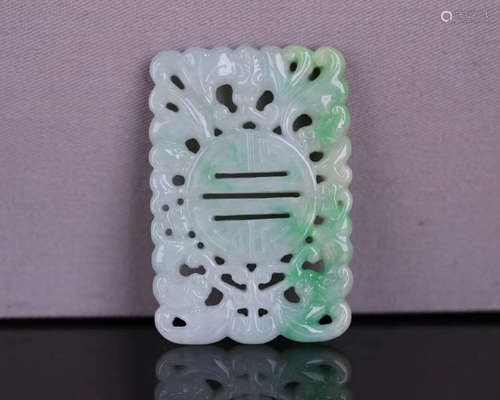 A JADEITE CARVED FLAT PENDANT