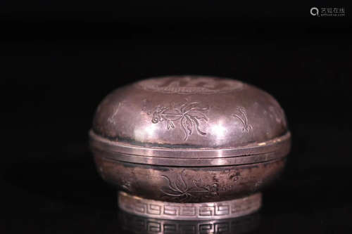 A SILVER MOLDED BOX