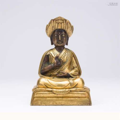 TIBETAN GILT BRONZE SEATED GURU