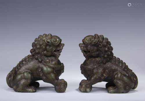 PAIR OF CHINESE SPINACH JADE LIONS