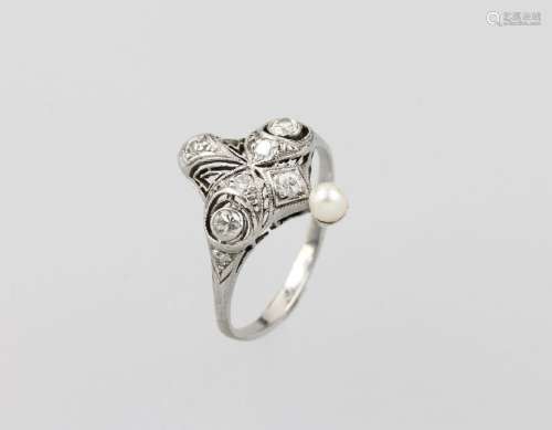 Platinum ring with diamonds and pearl