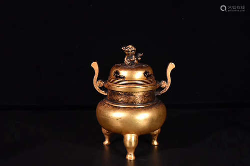 A GILT BRONZE THREE-FOOT FURNACE