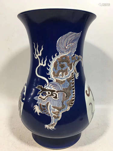 A GLAZE BLUE AND UNDERGLAZE RED RIVET MOUTH VASE