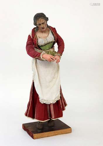 A NEAPOLITAN NATIVITY FIGURE circa 1780 Woman in