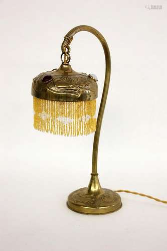 A TABLE LAMP France, 1920s/1930s Brass frame with