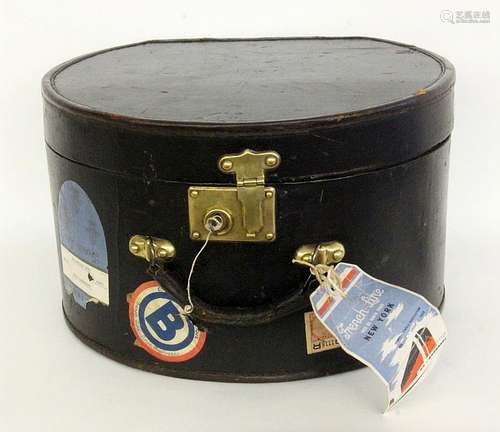 A TRAVEL HAT BOX Leather cover with brass