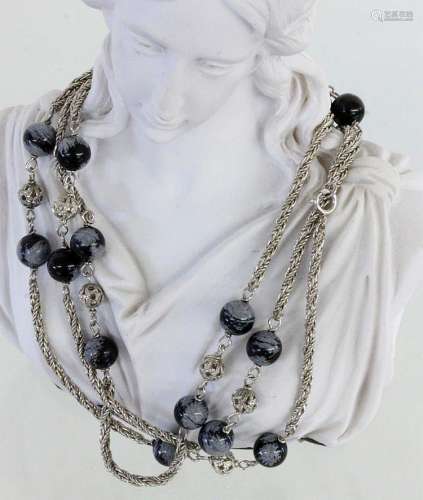 A NECKLACE Silver with snowflake obsidians. 98 cm