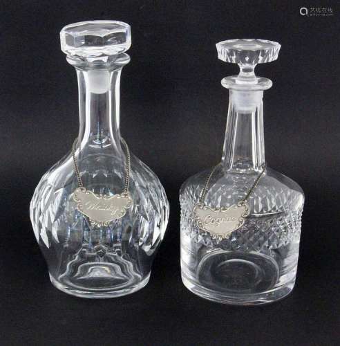 A PAIR OF CRYSTAL DECANTERS with pendants. 24/25