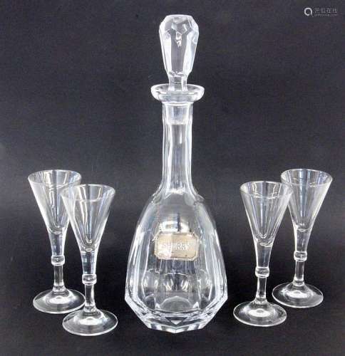 A CRYSTAL DECANTER WITH SILVER PENDANT and 4
