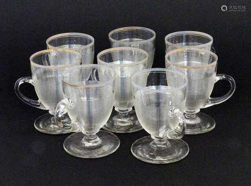 A SET OF 8 HANDLED CUPS German circa 1900