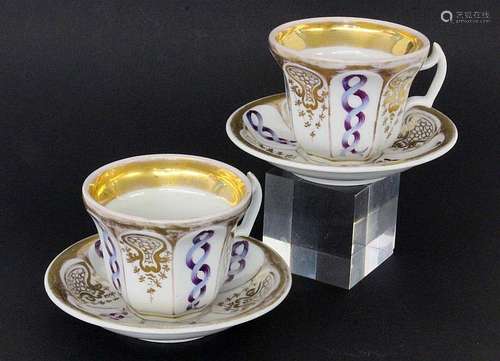 A PAIR OF BIEDERMEIER CACAO CUPS WITH SAUCERS