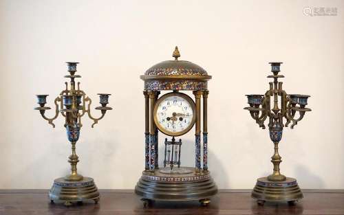 A LargeFrench Cloisonné Clock with Two Candle Holders