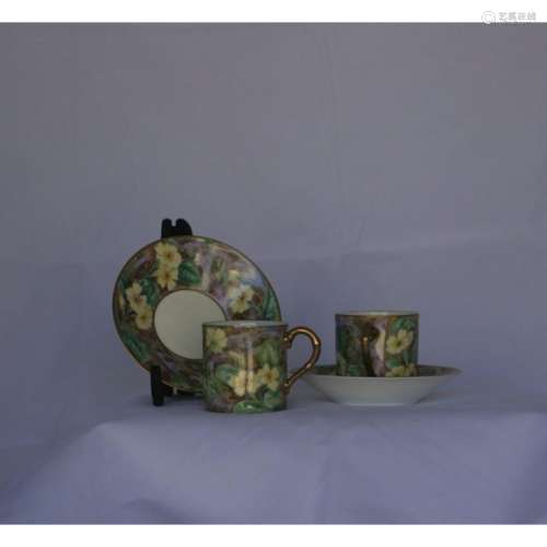 A Pair Of Royal Worcester Cups And Saucers