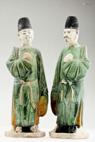 A Pair of Han Dynasty Green Glaze Officer Figures.