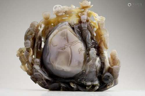 A Large Agate with Carved Figural Scenes.