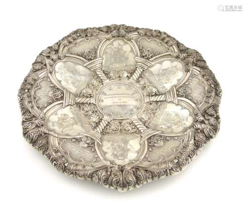 A Portuguese silver presentation dish, Oporto circa 1953, circular form, embossed foliate border,