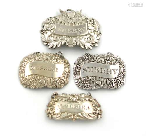 A collection of four early 19th century silver wine labels, various dates and makers, foliate