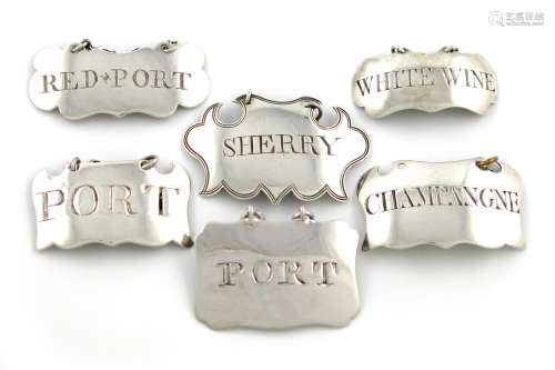 A collection of six 18th and 19th century silver wine labels, various makers, some unmarked, plain