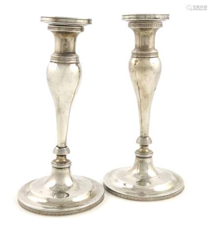 A pair of early 19th century Austro-Hungarian silver candlesticks, maker's mark LT, Vienna 1821,