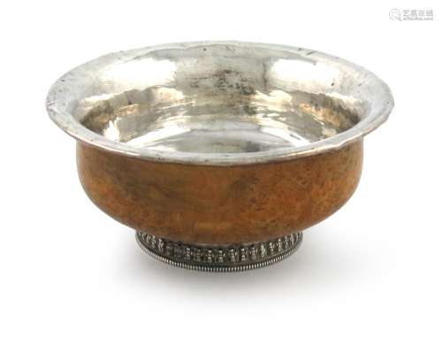 A Far Eastern metalware mounted wooden mazer bowl, unmarked, circular form, plain lining, on a