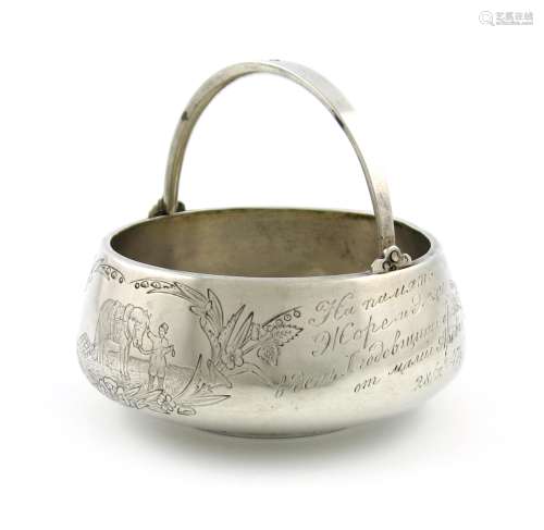 A late-19th century Russian silver swing-handled sugar basket, Moscow 1892, tapering circular