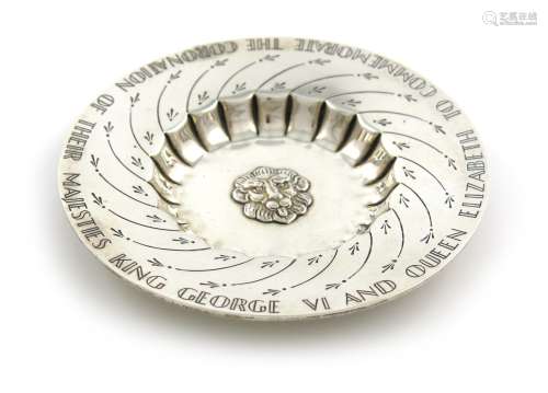 A commemorative silver dish, by The Barnards, London 1936, circular form, the centre with a