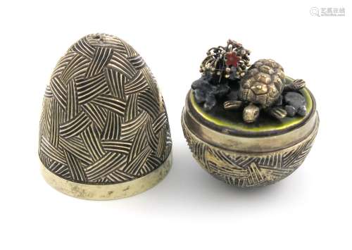 By Stuart Devlin, a modern silver-gilt surprise egg, London 1979, no.279. textured decoration, the