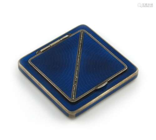 An Austrian silver and enamel compact, square form, dark blue enamel decoration, the hinged cover