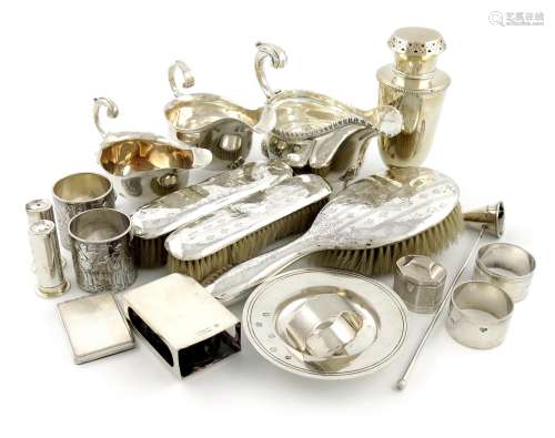 A mixed lot of silver items, comprising: a late-Victorian sauce boat, by Charles Stuart Harris,