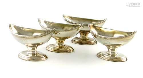 A set of four George III silver salt cellars, by William Sumner, London 1786, oval form, on a raised