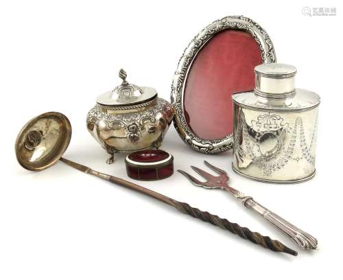 λA mixed lot of silver items, comprising: a late-Victorian tea caddy, by Carrington and Co, London