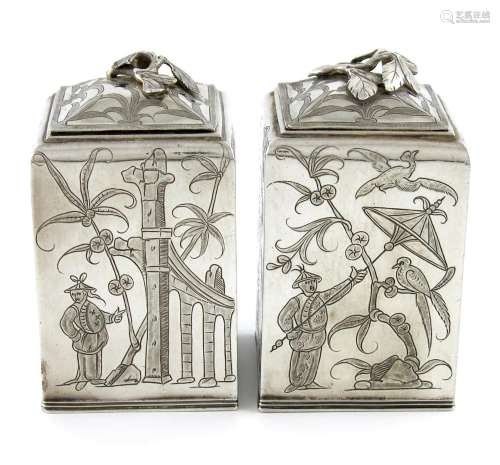 A pair of Charles II silver Chinoiserie toilet boxes, maker's mark only, that of PM between two