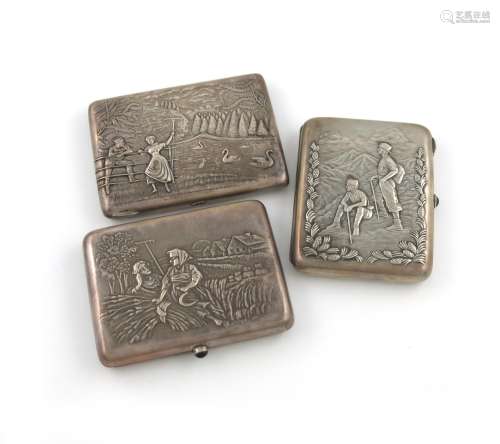 A collection of three Russian silver cigarette cases, various dates and makers, rectangular form,