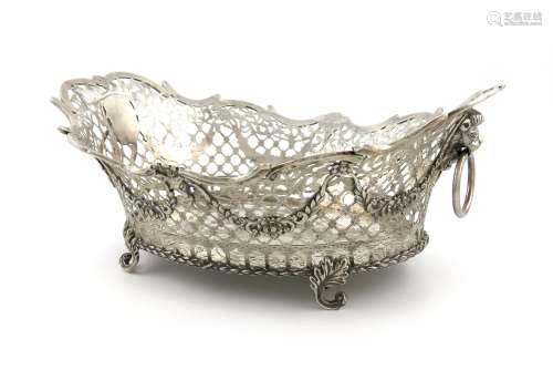 A late 19th century Dutch silver basket, with pseudo earlier marks, shaped oval form, scroll