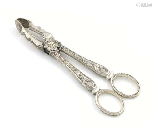 A pair of George III silver sugar cutting tongs, by William Edwards, London 1820, chased foliate