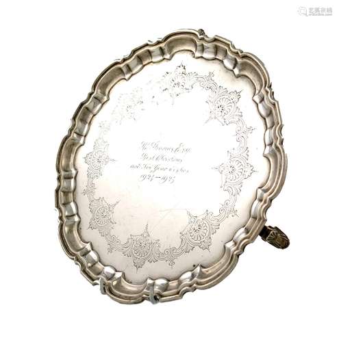 A silver salver, by Mappin and Webb, Sheffield 1923, circular form, moulded border, inscribed, on