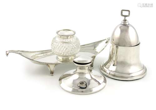 A silver inkwell, by Robert Pringle and Sons, Chester 1928, oval form, on four bracket feet, with
