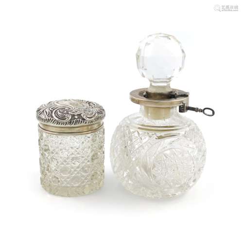 A late-Victorian silver-mounted lockable scent bottle, by the Betjemann Brothers, London 1898, hob-