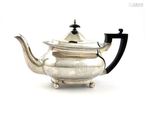 A Victorian silver teapot, by Walker and Hall, Sheffield 1894, oblong bellied form, scroll handle,