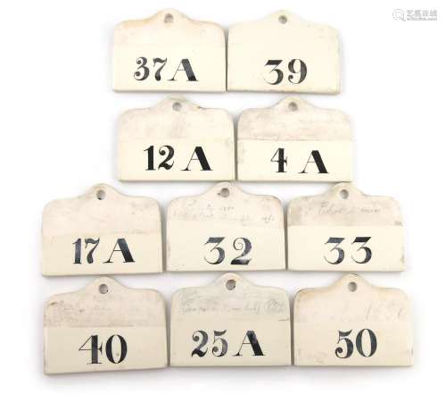 A collection of ten early 19th century ceramic bin labels, some by Wedgwood, arched rectangular