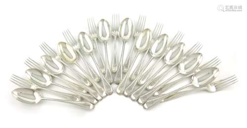 A set of twelve Victorian silver Bead pattern table forks and spoons, by George Adams, London
