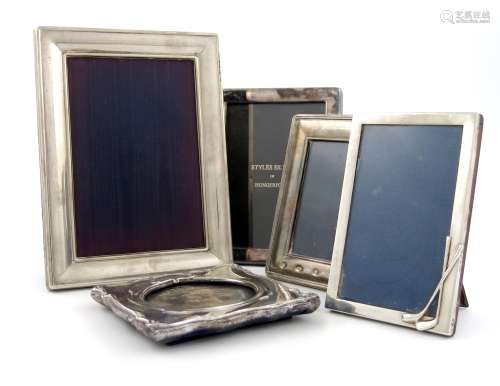 A collection of silver photograph frames, various dates and makers, rectangular form, one mounted