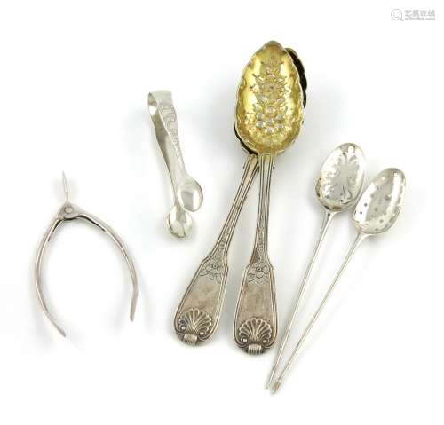 A mixed lot of silver items, comprising: two 18th century mote spoons, a pair of unmarked wishbone