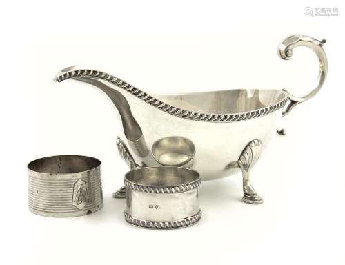 A silver sauce boat, by Mappin and Webb, Sheffield 1930, oval form, gadroon border, leaf capped