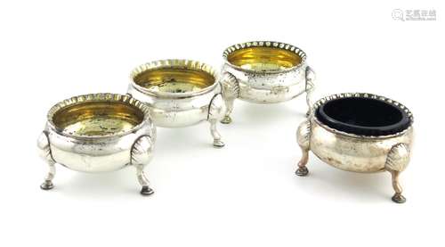 Two similar pairs of Scottish George III and William IV silver salt cellars, comprising: one pair by