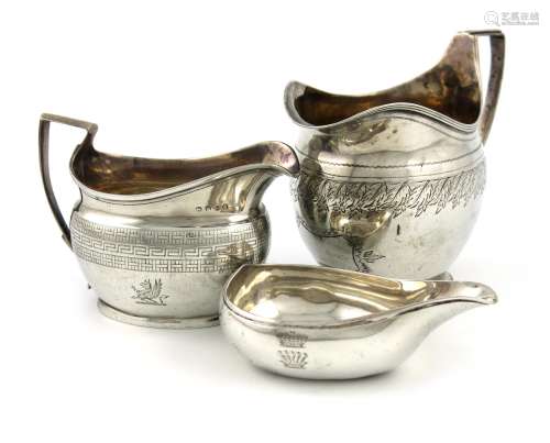 A small mixed lot of Georgian silver items, comprising: a cream jug Urquhart and Hart, London