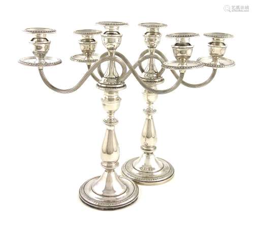 A pair of American silver three-light candelabra, baluster columns, reeded scroll handles, urn