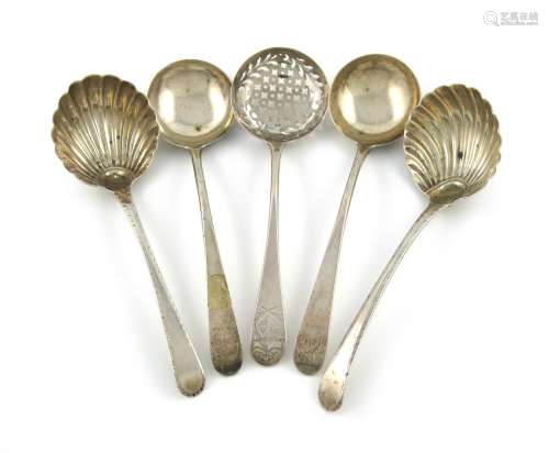 A small mixed lot of silver flatware, comprising: a pair of George III Feather-edge pattern sauce