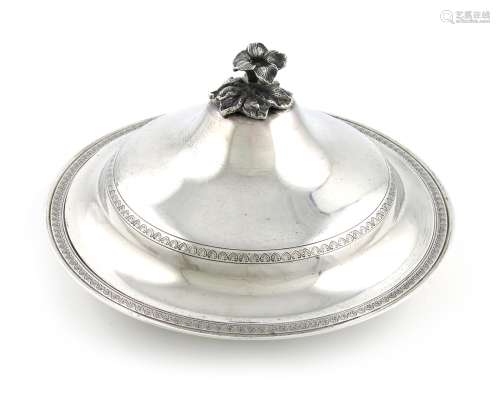 An Egyptian silver dish and cover, circular form, the domed pull-off cover with a flower finial,