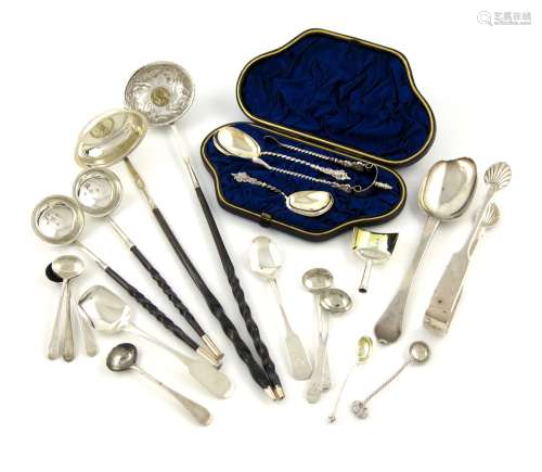 λA mixed lot of silver flatware, various dates and makers, comprising: a cased tea caddy spoon,
